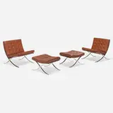 Barcelona chairs and ottomans, pair by Ludwig Mies van der Rohe, 1925 / 1986, stainless steel, leather, sold May 2023