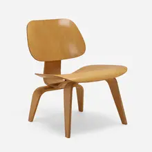 LCW by Charles and Ray Eames, molded ash plywood, rubber, sold May 2023