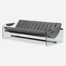 Sofa by Adrian Pearsall, c. 1965, vinyl, glass, enameled steel, walnut, sold May 2023