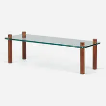 Coffee table by Adrian Pearsall, c. 1965, glass, walnut, sold May 2023