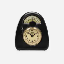 Measured Time clock and kitchen timer by Isamu Noguchi, c. 1932, Bakelite, glass, printed paper, enameled brass, sold May 2023
