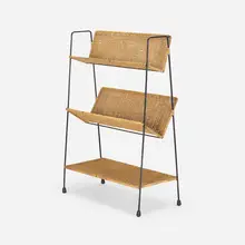 Bookshelf by Modern, c. 1965, enameled steel, rattan, cane, rubber, sold May 2023