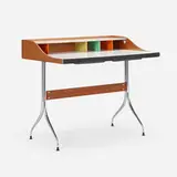 Swag Leg desk by George Nelson & Associates, 1954, walnut, chrome-plated steel, laminate, lacquered wood, sold May 2023