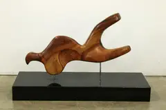 studio sculpture by Judith Reifman, carved wooden figure. Measures 18 1/2" high x 30" wide, offered Mar 2018