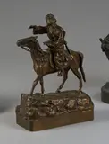 Cosaque à cheval by Vassili Yakovlevitch Grachev, Bronze à patine médaille signé sur la base, avec cachet du fondeur C, sold Jan 2025