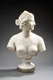 Buste de femme coiffée à l'antique de profil by Antonio Frilli, Marbre blanc sur piédouche reposant sur une base circulaire en marbre veiné Signé et local, sold Jun 2026