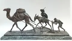Edouard DROUOT (1859-1945) Fellah labourant avec son dromadaire, un autre auprès de lui monté sur une mule by Edouard Drouot, Epreuve en Bronze, fonte d'édition non numéroté de chardon à patine brune nuancée et vert, sold Jun 2022