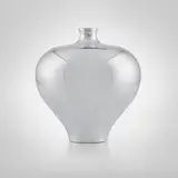 Urn by Karim Rashid, 2003, polished metal, sold May 2023