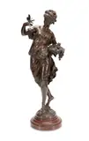 Allegory of Spring / 'Woman with Basket - circa 1880 by Mathurin Moreau, bronze sculpture on red marble base, sold Sep 2024