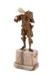 Untitled - Male Playing Flute by Dominique Alonzo, bronze sculpture on onyx plinth, sold Sep 2024