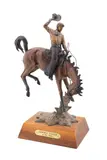 Cowboy Tough by Chris Navarro, bronze on wooden plinth, sold Oct 2024