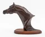 Untitled by Snell Johnson, bronze horse bust sculpture of NV Pingo mounted on an ovoid wooden base, sold Jul 2022