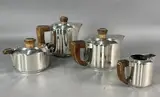 & CHRISTOFLE Service à thé café Art déco en métal argenté, modèle by Luc Lanel, Panneau plissé", manches et prises en bois, comprenant: une théière, une cafetière, un suc, sold Mar 2025