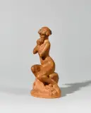 Le fruit défendu by André de Manneville, Terre cuite figurant une femme assise nue sur un rocher mangeant un fruit Signée, sold Jun 2026