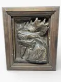 & ÉTABLISSEMENTS GENTIL & BOURDET (éditeur) « Chantecler by Paul Jouve, Panneau en céramique à décor en haut-relief d’une tête de coq enchâssé dans un cadre en bo, sold May 2026