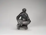 Hunter with Catch (00783) by James Putugu, stone sculpture, sold Jan 2026