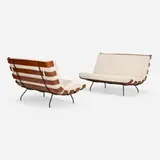 Settees, pair by Martin Eisler & Carlo Hauner, c. 1955, mahogany, walnut, felt upholstery, enameled steel, brass, sold May 2023