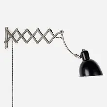 Scissor wall lamp by Modern, c. 1935, enameled aluminum, chrome-plated steel and aluminum, sold May 2023