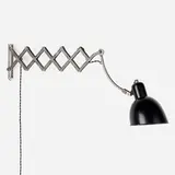 Scissor wall lamp by Modern, c. 1935, enameled aluminum, chrome-plated steel and aluminum, sold May 2023