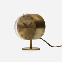 Table clock, model 4766 by George Nelson & Associates, 1949, brass, acrylic, enameled aluminum, sold May 2023