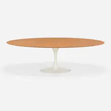 Tulip dining table, model 175W by Eero Saarinen, mahogany, enameled aluminum, sold May 2023