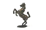 A rearing horse by Umberto Vandoni, Patinated bronze, offered May 2026
