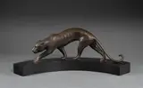 Panthère à l'affût by Georges Lavroff, Épreuve en bronze patiné sur un socle en marbre semi circulaire, sold Apr 2026