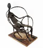 Femme dans un fauteuil by Robert Couturier, 1950, Bronze à patine foncée et traces de dorure Sur base en bois Inscription sous la cuisse gau, sold Mar 2026