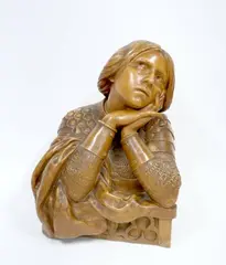 Buste de Jeanne d'Arc en armure, pensive, accoudée à une rambarde by Charles Masse, Terre cuite patinée Signé sur le côté et cachet "terre cuite de France" au dos, sold Apr 2026