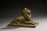 Lion couché by Édouard Léon Chapelle, Épreuve en bronze à patine dorée nuancée sur socle quadrangulaire, sold Apr 2026