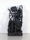 Beer Can Leg by Aaron Spangler, carved and painted wood, sold Oct 2025