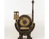 Curule by Carlo Bugatti, Bois noirci, parchemin peint, laiton, cuivre et, sold Dec 2016