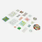 Collection of twenty trays by Frances and Michael Higgins, c. 1960, fused glass with copper inclusions, sold May 2023