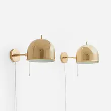 Sconces, pair by Bergboms, c. 1950, brass, sold Apr 2023