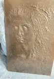 Pensive Lady with Long Hair by Kahlil Gibran, bronze plaque, sold May 2023