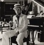 Elton John at Home in Windsor by Terry O'Neill, Silver gelatin print, printed later, image size, sold May 2026