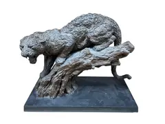 A bronzed composition leopard on a branch by William Timyn, sculpture, sold Apr 2026