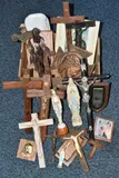 to include approximately twelve crucifixes mostly wooden, some with by One Box Of Religious Items, sculpture, sold Aug 2025