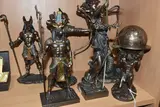 in bronzed resin, comprising Robin Hood (sword broken off but by Six 'veronese Design' Figures, sculpture, sold Jun 2025