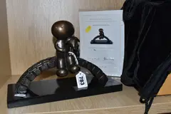 Watching the world go by by Doug Hyde, bronze, sold May 2025