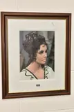 a signed and framed studio photograph of the legendary actress in her iconic by Elizabeth Taylor, photograph, offered Apr 2025