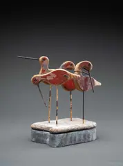 Untitled by Guy Taplin, Wood with metal nail beaks, on a driftwood base with metal supports, sold Dec 2025