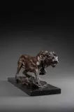 Stalking Lion Signed by Jonathan Kenworthy, Bronze on a black marble base, offered Dec 2025