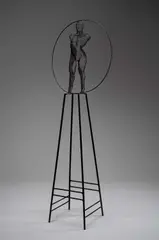 Nude Figure within a Wheel Black wire mesh on a metal stand 93 by David Begbie, sculpture, sold Dec 2025