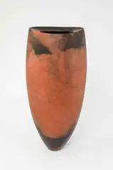 A tall vessel burnished and smoke fired in terracotta and black by Gabriele Koch, sculpture, sold Dec 2025