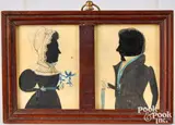 and hollowcut silhouettes of a man and woman by the Puffy Sleeve Artist Ezra Wood, watercolor, sold Jan 2026
