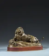 Lion attaquant un serpent by Clovis-Edmond Masson, Bronze d'édition à patine mordorée, sold May 2026