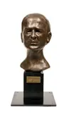 PORTRAIT DE PIERRE CARDIN by Roland D'andlau, Plâtre à patine bronze, sold Oct 2025