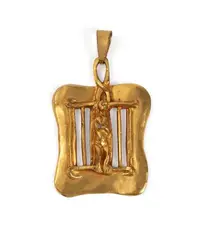 Pendentif représentant le martyre de Saint Laurent, circa 1950 by Line Vautrin, Épreuve en bronze doré, sold Jun 2026