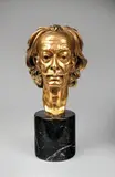 Dali by Arno Breker, 1975, Bronze doré sur socle cylindrique en marbre noir, sold Aug 2026
